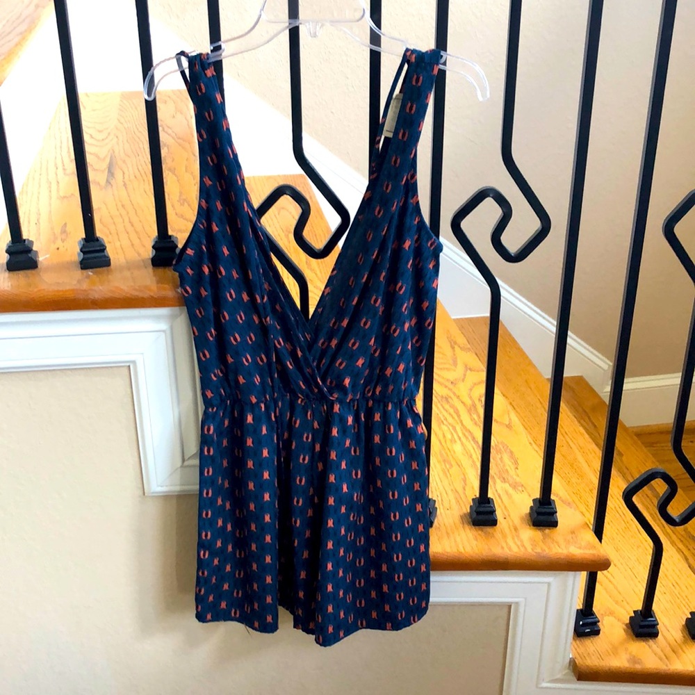Navy with orange accent romper